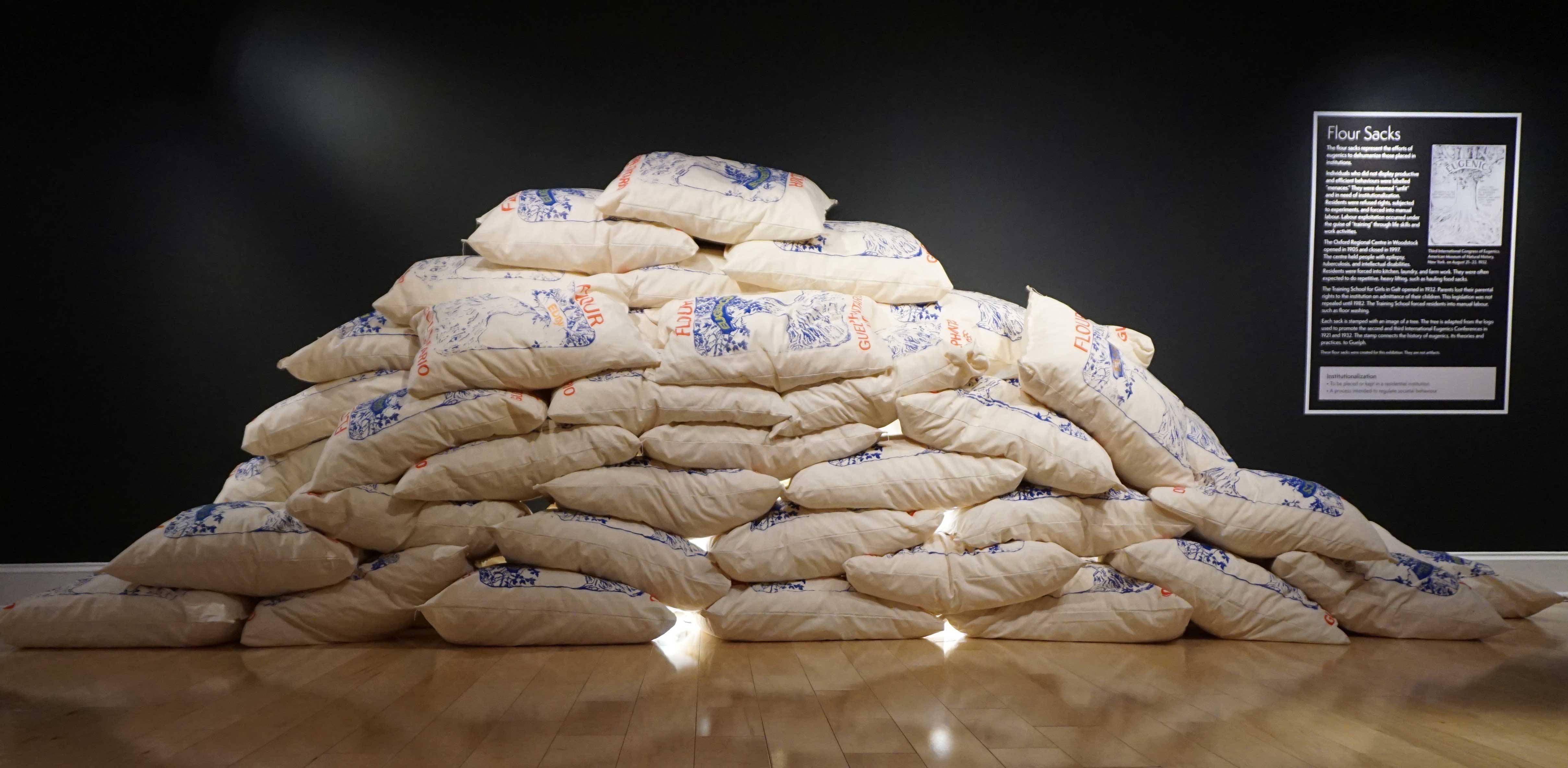 A pile of flour sacks in an exhibit
